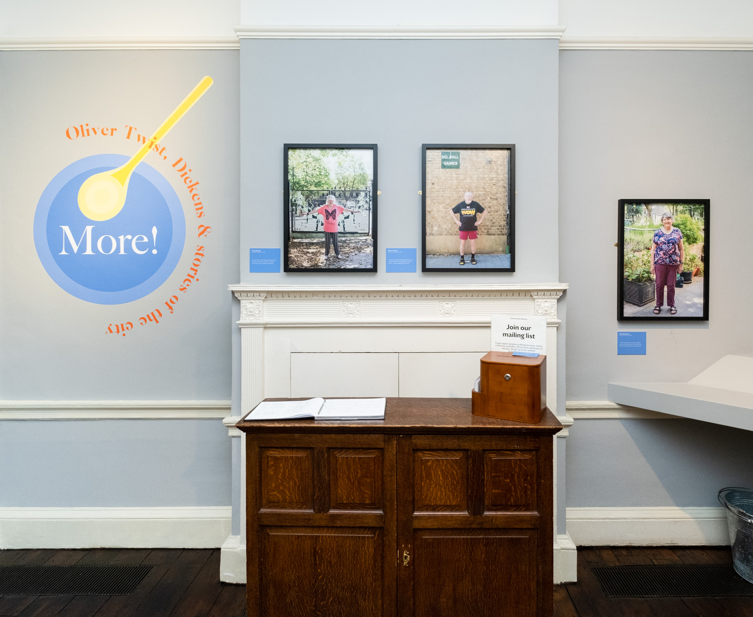 Installation photograph of portraits taken by Jayne Lloyd for 'Tales from the Third Age Project', part of 'More!', on display at The Charles Dickens Museum, Doughty Street, London. Photograph by Jayne Lloyd.