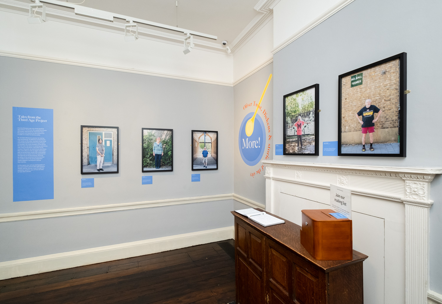 Installation photograph of portraits taken by Jayne Lloyd for 'Tales from the Third Age Project', part of 'More!', on display at The Charles Dickens Museum, Doughty Street, London. Photograph by Jayne Lloyd.