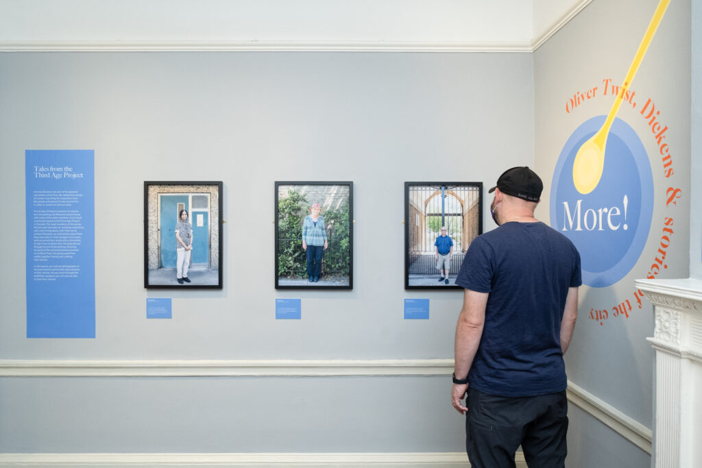 Installation photograph of portraits taken by Jayne Lloyd for 'Tales from the Third Age Project', part of 'More!', on display at The Charles Dickens Museum, Doughty Street, London. Photograph by Jayne Lloyd.