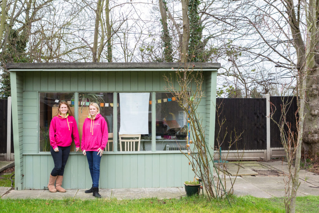 Ruth and Sarah run a marketing business. They work in an office at the end of Ruth's garden. Part of the Home/Work project by Jayne Lloyd, documenting people who work from home.